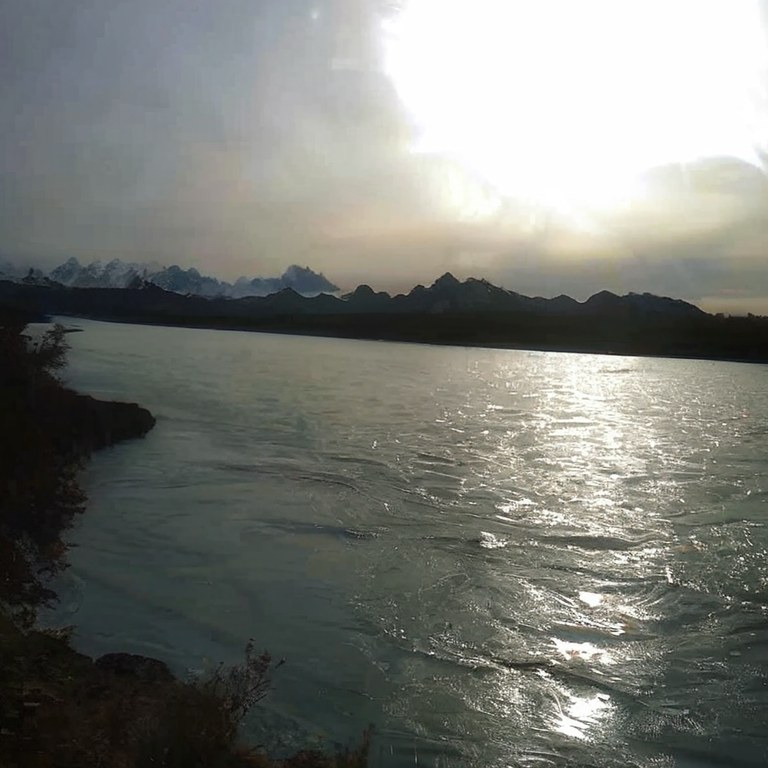 RFA output: the river clear, mountains visible.